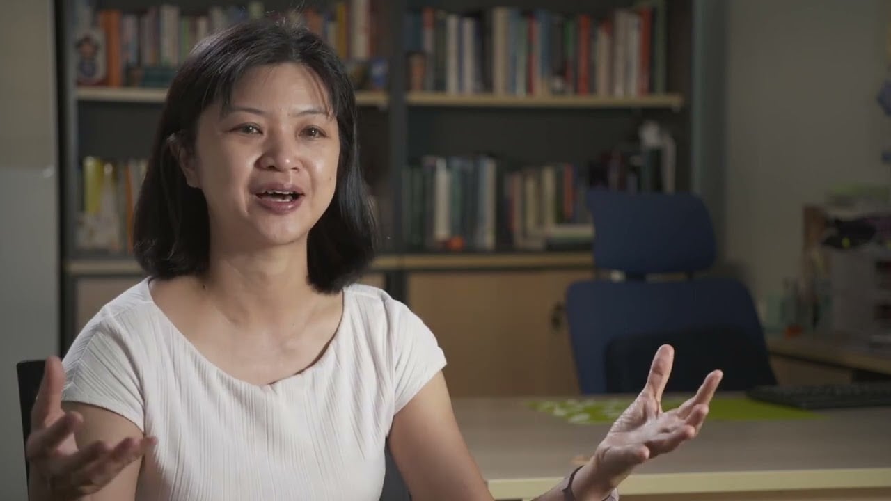 Women using hands to describe mental health project in Malaysia